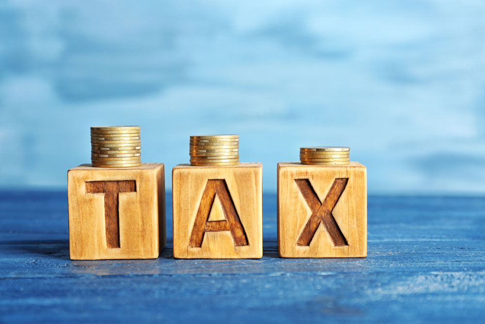 How To Choose Between New And Old Tax Regimes?